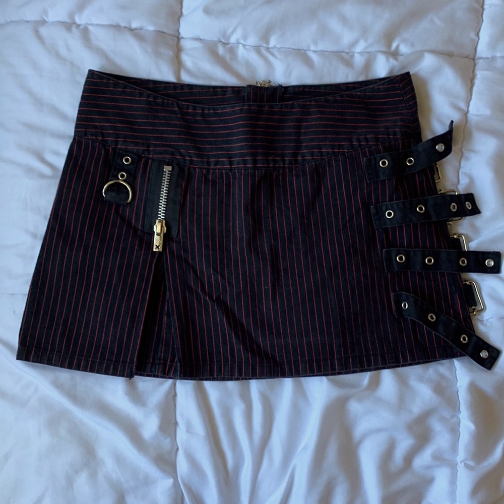 Tripp nyc mini skirt black with red pinstripes zipper and belt buckle details.